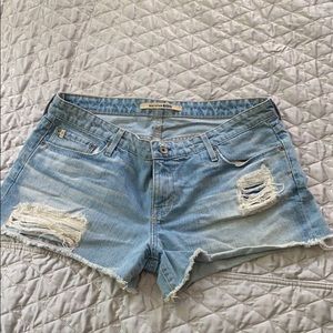 Cut off distressed light wash denim shorts